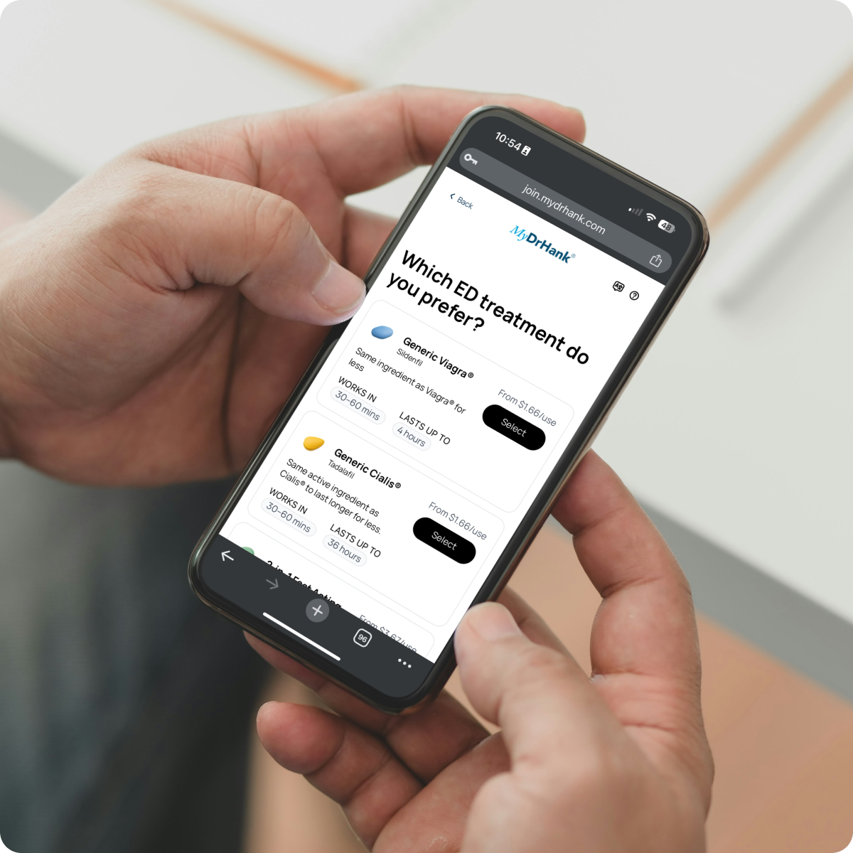 Person holding a smartphone displaying the MyDrHank website with ED treatment options, including Generic Viagra and Generic Cialis, on a product comparison page